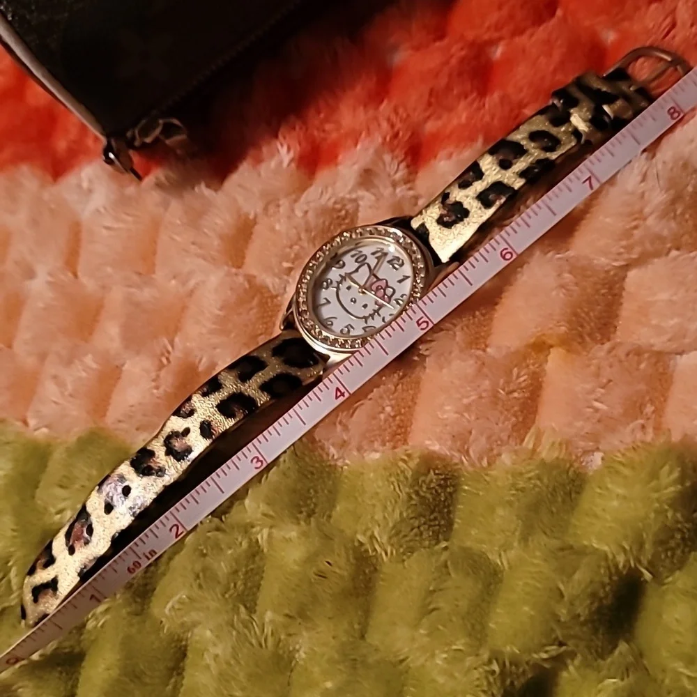 Sanrio Hello Kitty Gold Crystal Studded Bezel Leopard Print Band Textured Face‎